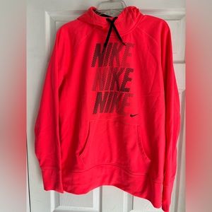 Nike therma-fit hooded sweatshirt, fluorescent pink.